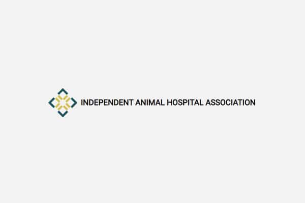 Logo of the Independent Animal Hospital Association featuring a geometric design of interlocking shapes to the left of the organization's name in black text on a light background.
